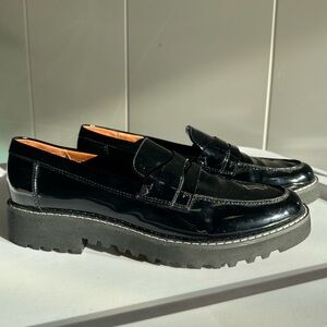 Black patent leather lug soles penny loafer. Like new. Size 8.5